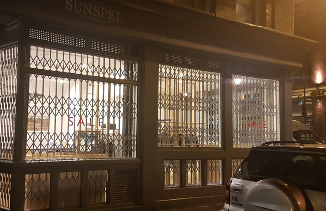 RSG1000 retractable grilles securing Sunspel shopping outlet in London City.