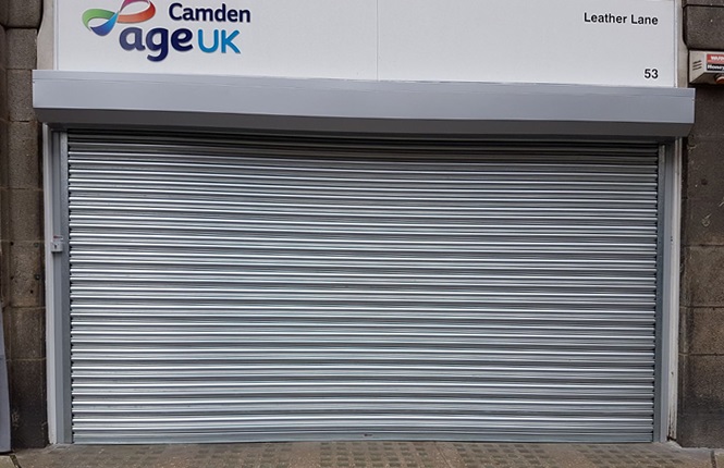 RSG5000 commercial shutter fitted to the entrance of Age UK charity shop in Holborn, Central London.
