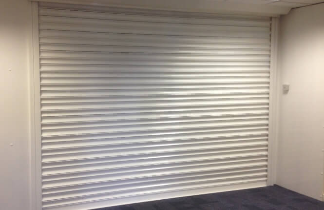 RSG5000 security shutter fitted internally in a commercial outlet in Islington.