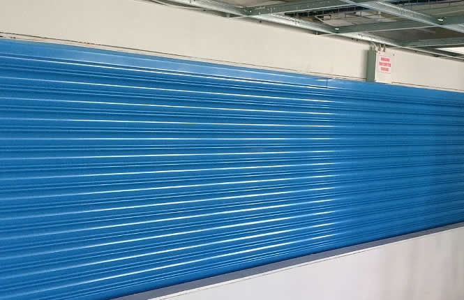 RSG5700 4Hour fire rated roller shutter fitted in the kitchen area of Hampton Junior School.