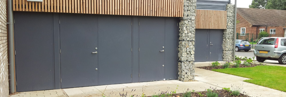 Entry steel security doors fitted at the rear of new commercial units in Surrey